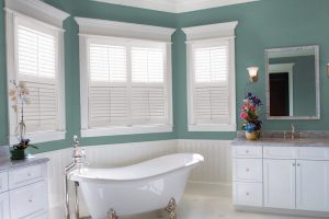 Shutters framed with crown molding