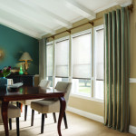 Graber Artisan Drapery and shades in earth-toned dining room